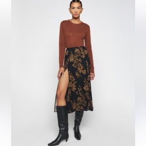 Reformation Zoe Skirt in black floral. Midi skirt with side slit
